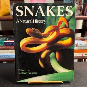 Snakes: A Natural History by Roland Bauchot - Black and Green Cover